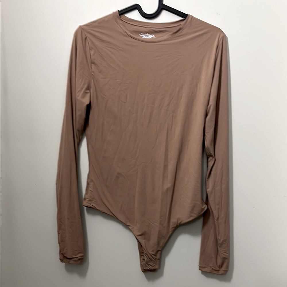 Elegant LG Tan Long Sleeve Bodysuit